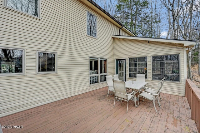 deck with outdoor dining space