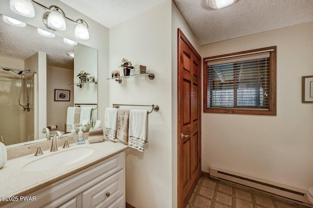 full bathroom featuring vanity, walk in shower, a textured ceiling, a baseboard heating unit, and tile patterned floors