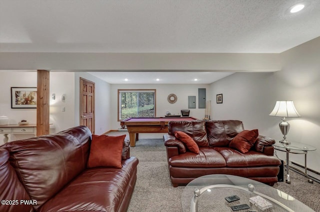 carpeted living room with recessed lighting, a textured ceiling, pool table, and electric panel