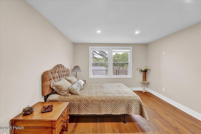 105 Cherry Point Ct, Hawley, PA 18428 - bedroom featuring wood finished floors, baseboards, and recessed lighting