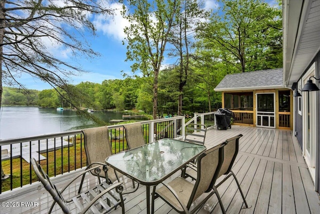 105 Cherry Point Ct, Hawley, PA 18428 - wooden terrace featuring a sunroom, outdoor dining space, a water view, and area for grilling