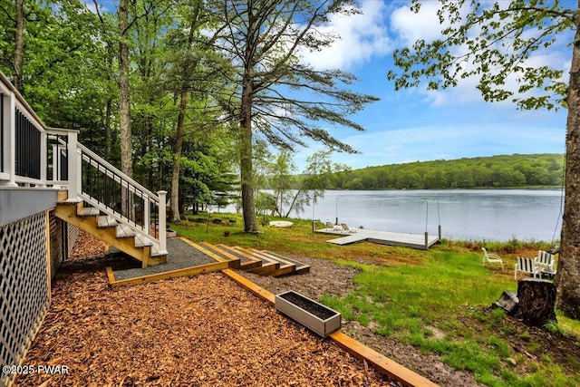 105 Cherry Point Ct, Hawley, PA 18428 - view of yard featuring a water view, stairs, and a wooded view