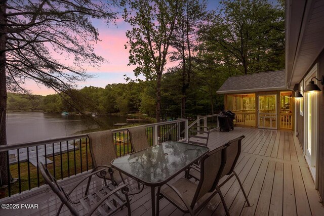 105 Cherry Point Ct, Hawley, PA 18428 - deck with outdoor dining area, a water view, area for grilling, and a sunroom