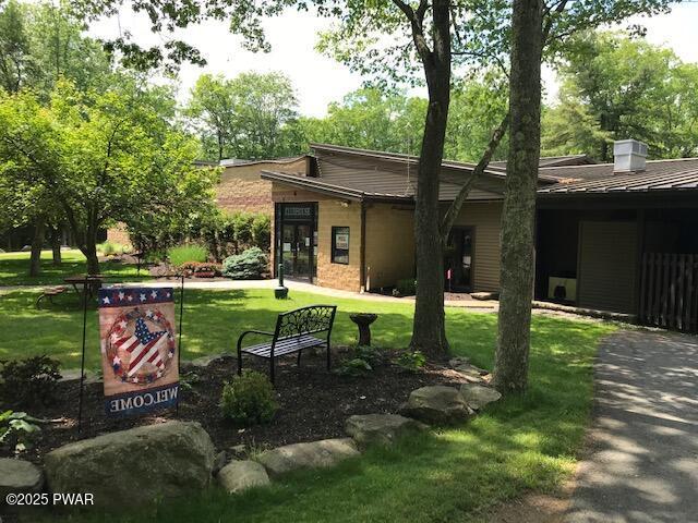 105 Cherry Point Ct, Hawley, PA 18428 - rear view of property with a lawn
