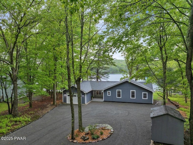 105 Cherry Point Ct, Hawley, PA 18428 - ranch-style house with asphalt driveway and an attached garage