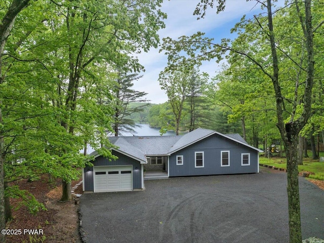 105 Cherry Point Ct, Hawley, PA 18428 - view of front of property featuring asphalt driveway and an attached garage