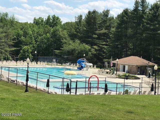 105 Cherry Point Ct, Hawley, PA 18428 - community pool with a water slide and a patio