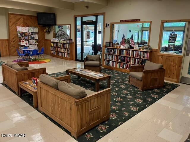 105 Cherry Point Ct, Hawley, PA 18428 - lobby with wooden walls and a wainscoted wall