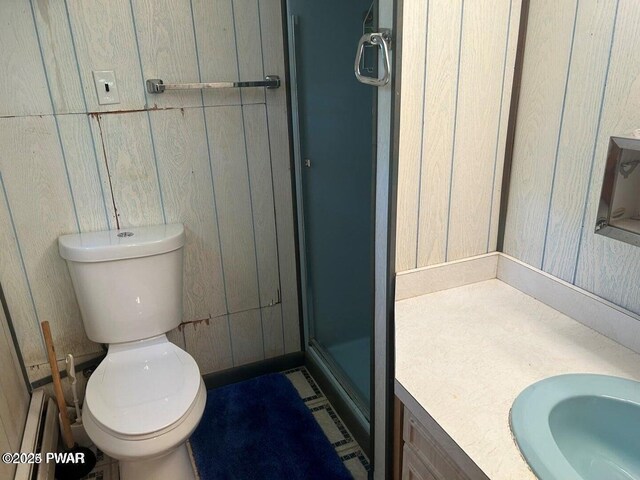 106 Chestnut Dr, Greentown, PA 18426 - bathroom featuring a shower stall, vanity, toilet, and wooden walls