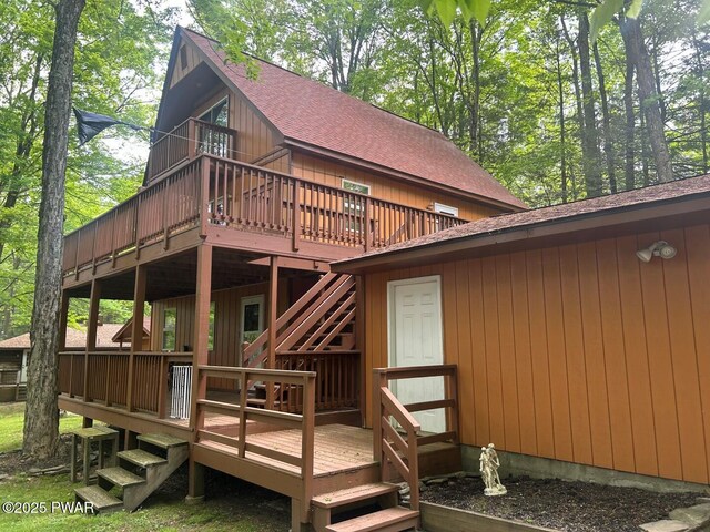 106 Chestnut Dr, Greentown, PA 18426 - rear view of property with roof with shingles, a wooden deck, and stairs