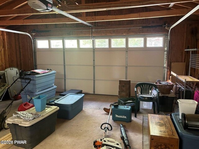 106 Chestnut Dr, Greentown, PA 18426 - garage featuring a garage door opener
