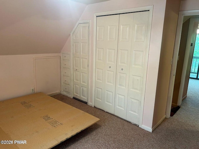 106 Chestnut Dr, Greentown, PA 18426 - unfurnished bedroom featuring carpet, vaulted ceiling, a closet, and baseboards