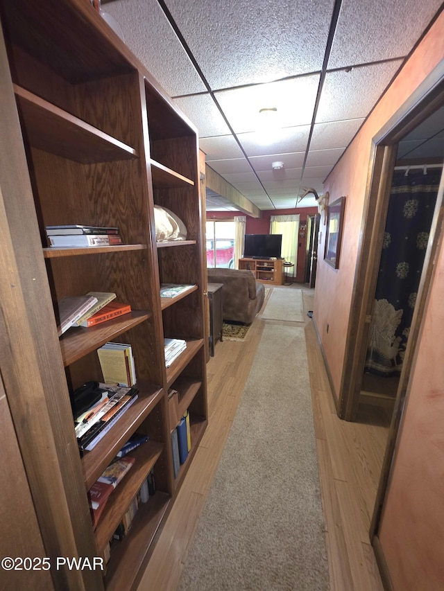 1304 Pratt Hollow Rd, Nicholson, PA 18446 - corridor featuring light wood-style flooring and a paneled ceiling