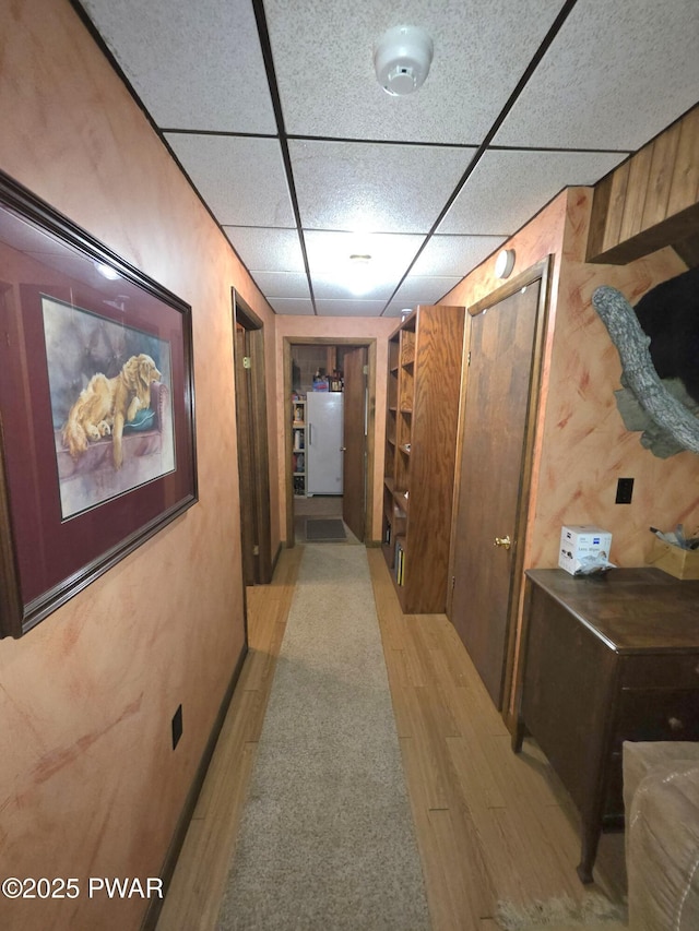 1304 Pratt Hollow Rd, Nicholson, PA 18446 - hall with light wood-style flooring and a paneled ceiling