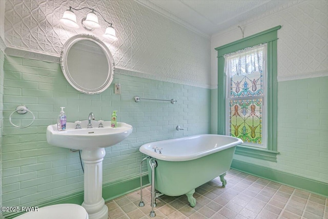 1409 Beach Lake Hwy, Beach Lake, PA 18405 - full bath featuring crown molding, toilet, baseboards, and a soaking tub
