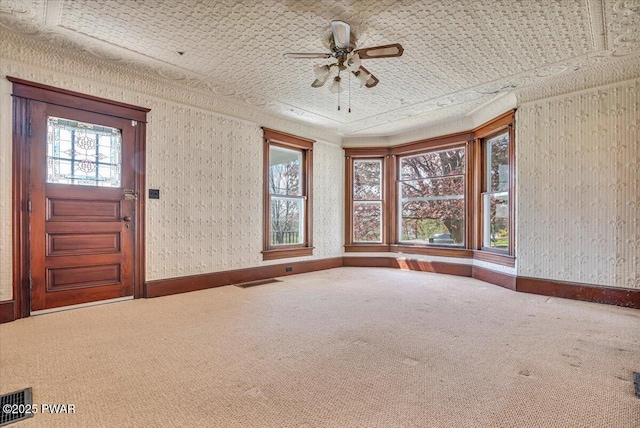 1409 Beach Lake Hwy, Beach Lake, PA 18405 - interior space with carpet flooring, baseboards, ceiling fan, and a healthy amount of sunlight