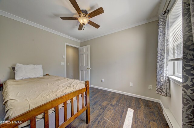 235 Oak Hill Rd, Hawley, PA 18428 - bedroom with baseboards, ornamental molding, a ceiling fan, and dark wood-type flooring