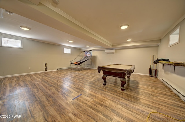 235 Oak Hill Rd, Hawley, PA 18428 - recreation room with a healthy amount of sunlight, ornamental molding, baseboard heating, and wood finished floors