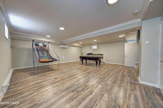 235 Oak Hill Rd, Hawley, PA 18428 - rec room with crown molding, a wall mounted air conditioner, baseboards, and wood finished floors