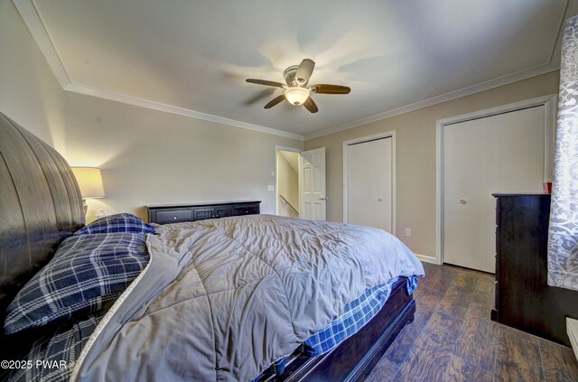 235 Oak Hill Rd, Hawley, PA 18428 - bedroom with a ceiling fan, multiple closets, ornamental molding, and hardwood / wood-style floors