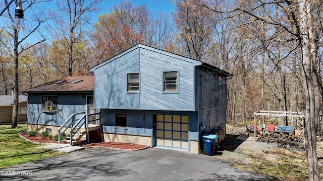 235 Oak Hill Rd, Hawley, PA 18428 - view of front of home featuring an attached garage and driveway