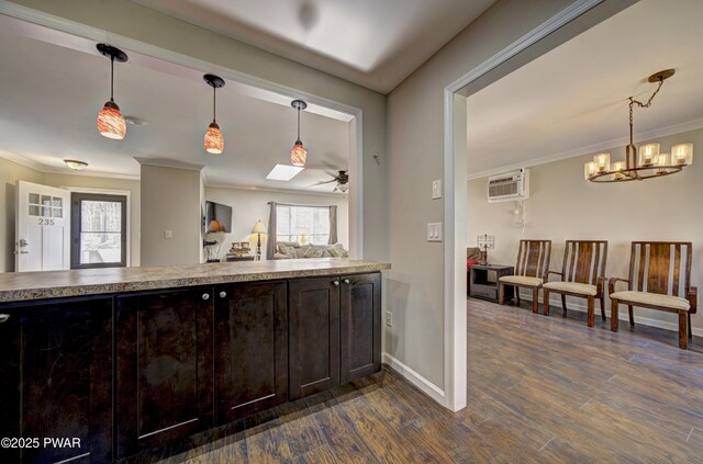 235 Oak Hill Rd, Hawley, PA 18428 - kitchen featuring crown molding, freestanding refrigerator, decorative backsplash, dark brown cabinets, and dark wood-style floors