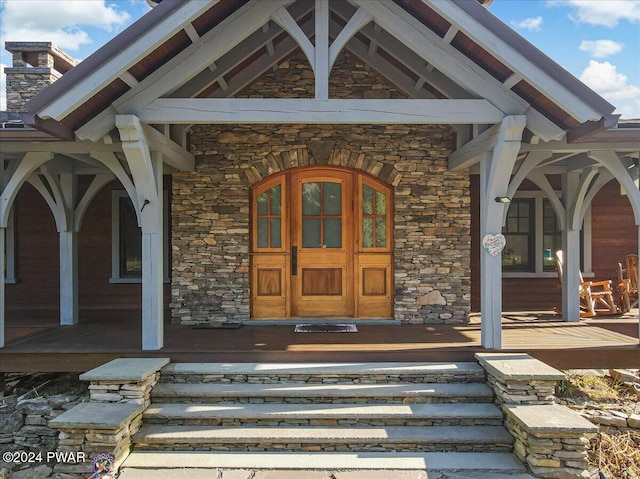 property entrance with covered porch