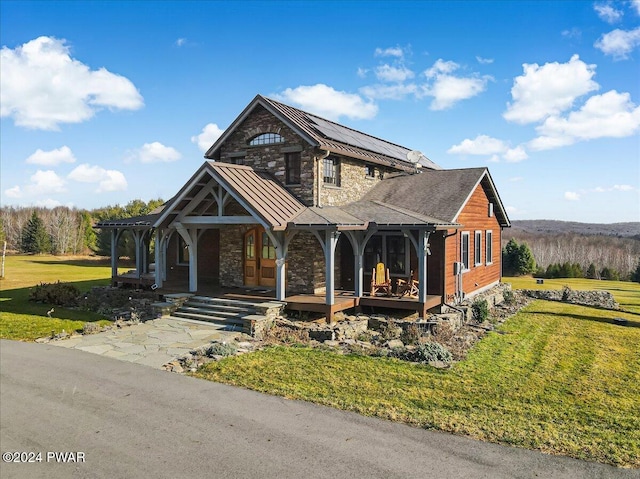 view of front of home featuring a porch and a front yard