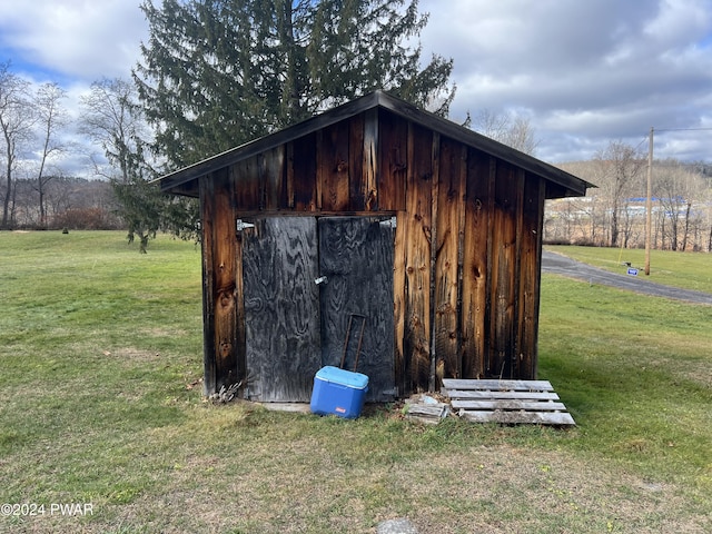 view of outbuilding featuring an outdoor structure