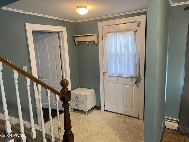 foyer entrance with stairway, a baseboard radiator, ornamental molding, and a wall mounted AC