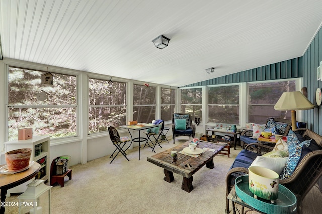 sunroom / solarium with vaulted ceiling