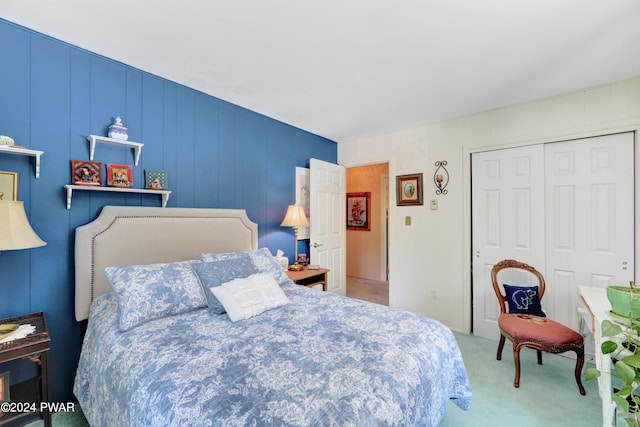 carpeted bedroom featuring a closet