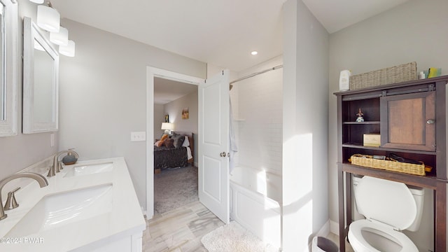 full bathroom featuring vanity, toilet, and shower / bath combination