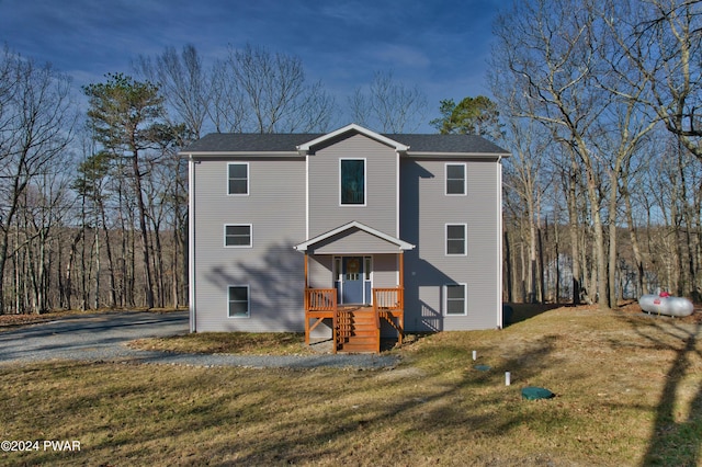 view of front of property with a front lawn