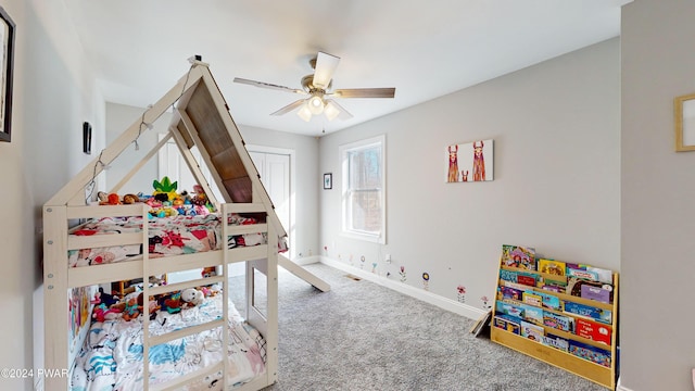 carpeted bedroom featuring ceiling fan