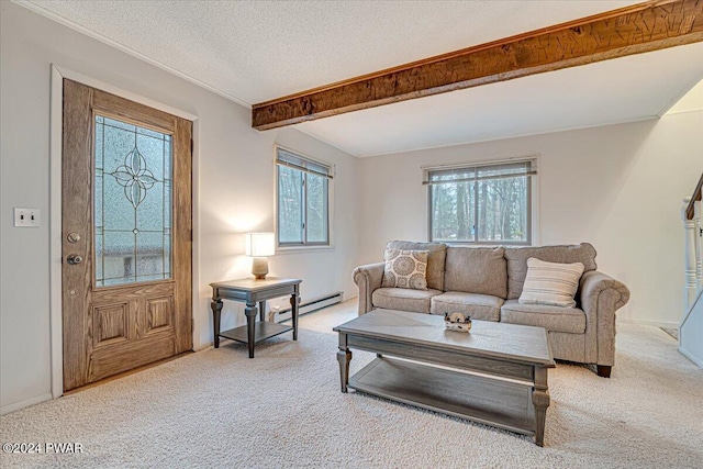 carpeted living room with beamed ceiling, a textured ceiling, baseboard heating, and plenty of natural light