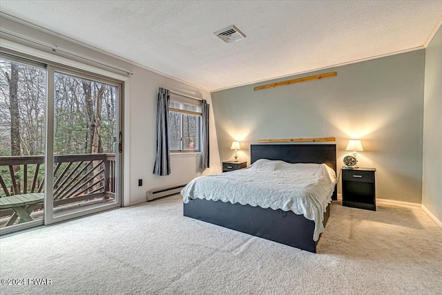 carpeted bedroom featuring ornamental molding, a textured ceiling, access to outside, and a baseboard heating unit