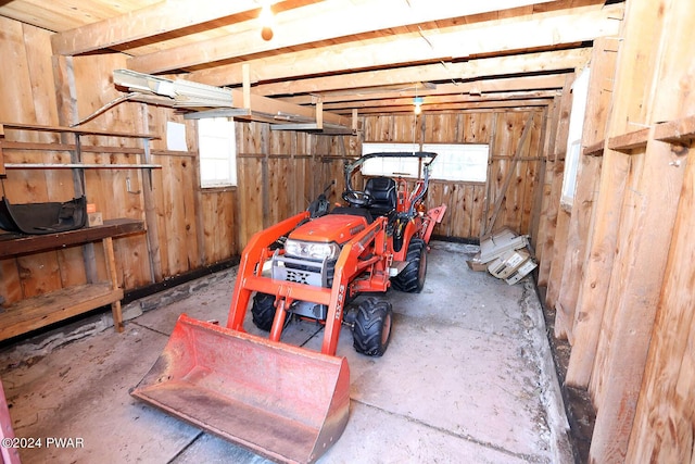 garage with wooden walls