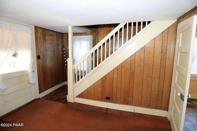 entrance foyer with wooden walls