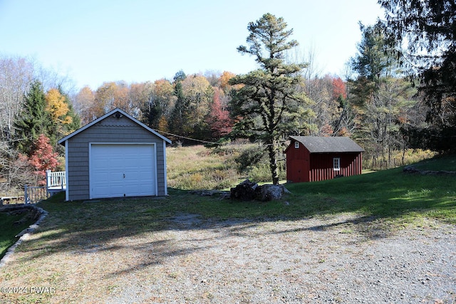 garage with a lawn