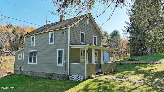 view of property exterior featuring a lawn