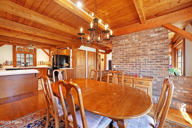 114 Wisener Ln, Shohola, PA 18458 - dining area featuring beam ceiling, light wood finished floors, wooden ceiling, and ceiling fan with notable chandelier