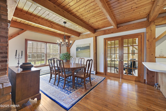 114 Wisener Ln, Shohola, PA 18458 - dining area featuring a chandelier, hardwood / wood-style floors, french doors, and beamed ceiling