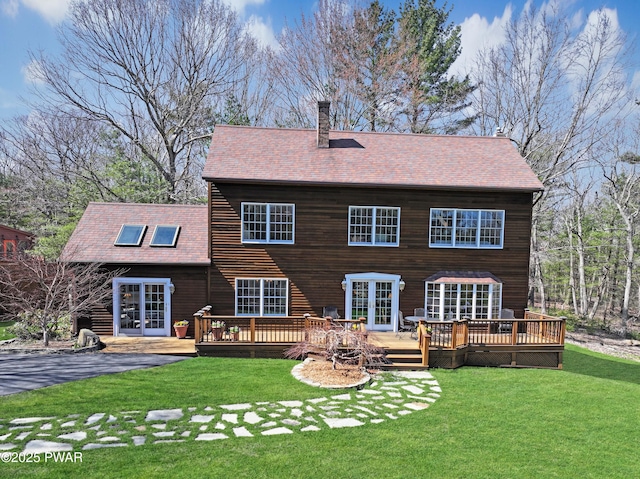 114 Wisener Ln, Shohola, PA 18458 - rear view of property with french doors, a wooden deck, a lawn, and a chimney