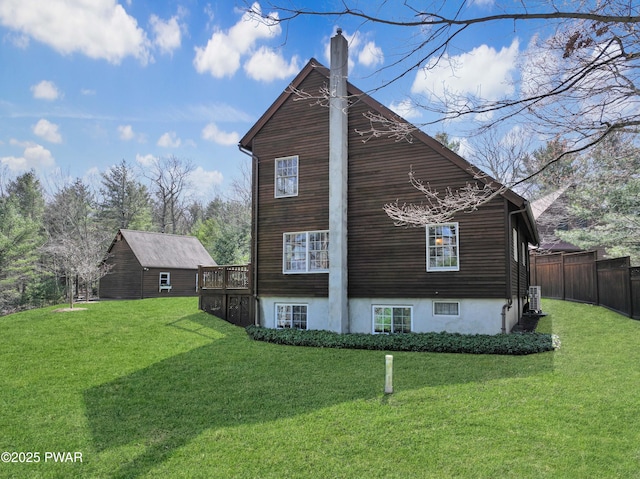 114 Wisener Ln, Shohola, PA 18458 - view of home's exterior featuring fence, a lawn, and a chimney