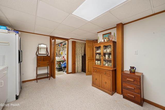114 Wisener Ln, Shohola, PA 18458 - interior space with baseboards, freestanding refrigerator, a paneled ceiling, and light carpet