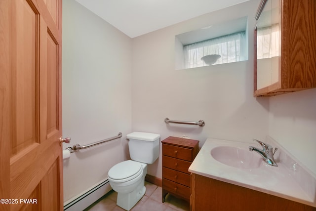 114 Wisener Ln, Shohola, PA 18458 - bathroom with tile patterned flooring, vanity, a baseboard heating unit, and toilet