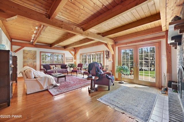 114 Wisener Ln, Shohola, PA 18458 - living area featuring beamed ceiling, light wood-style flooring, plenty of natural light, and wood ceiling