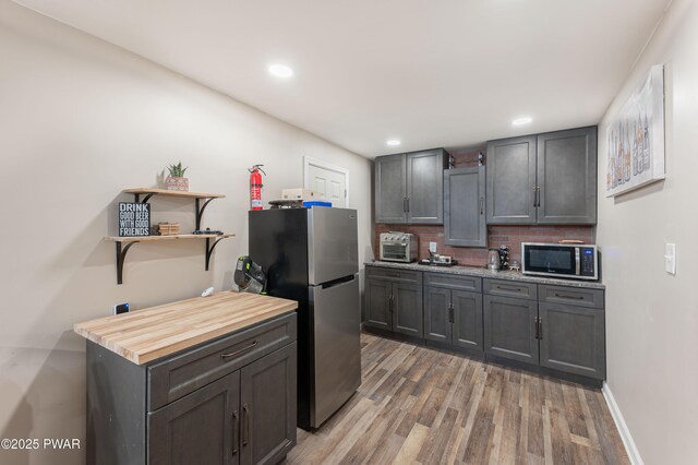 65 N Shore Dr, Albrightsville, PA 18210 - kitchen featuring appliances with stainless steel finishes, decorative backsplash, light wood finished floors, and recessed lighting