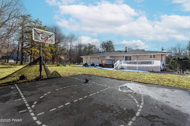 65 N Shore Dr, Albrightsville, PA 18210 - view of sport court with a lawn and a playground
